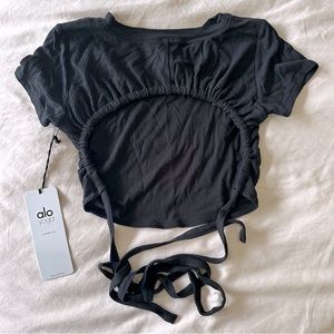 NWT ALO YOGA black short sleeve ribbed open back top size Small